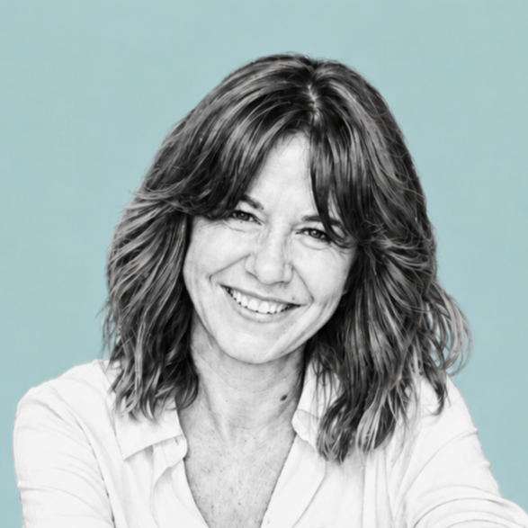 A smiling woman with shoulder-length hair and a white shirt against a light blue background.