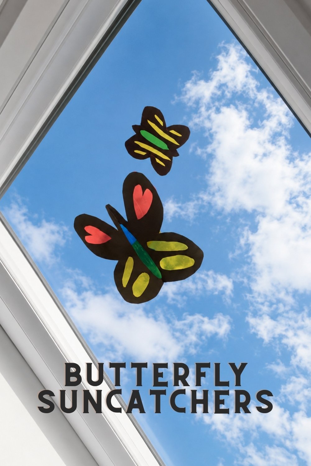 Colourful butterfly suncatcher craft made with translucent tissue paper.