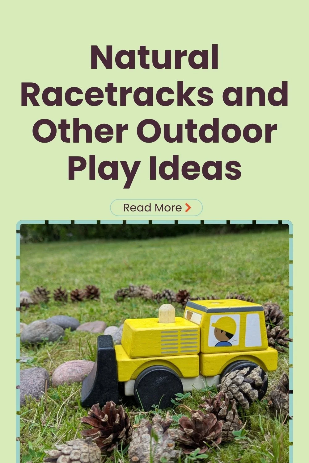 Natural Racetracks and Other Outdoor Play Ideas, with a toy construction vehicle driving through a track made from stones and pine cones on grass.