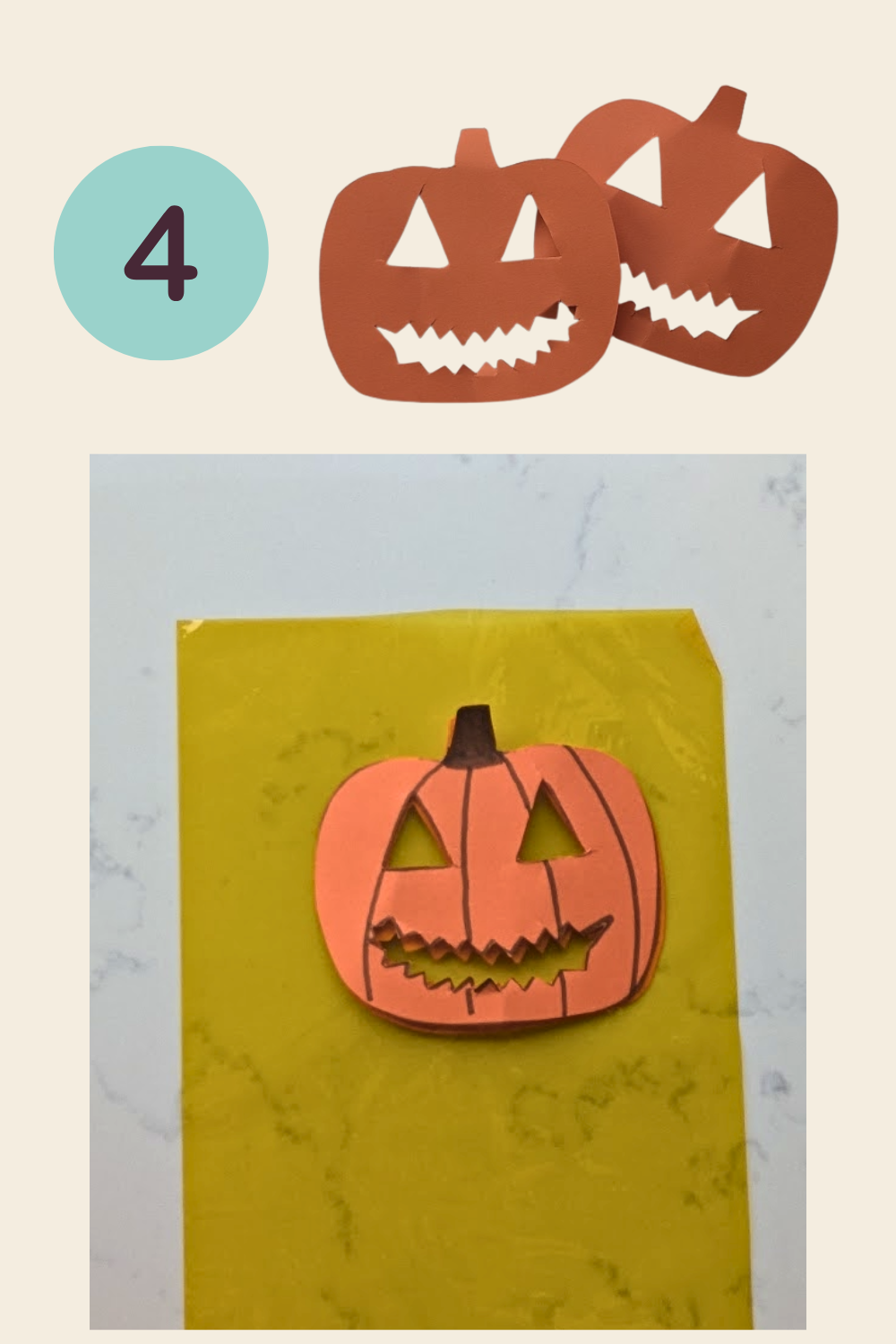 Step 4: Two orange paper pumpkins with cut-out eyes and mouths, and a decorated pumpkin placed on yellow cellophane ready for assembly.