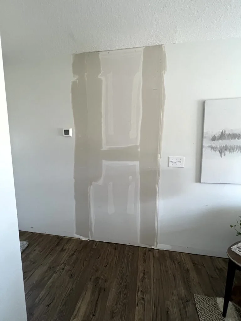  What was a doorway to the kitchen now closed in with drywall  