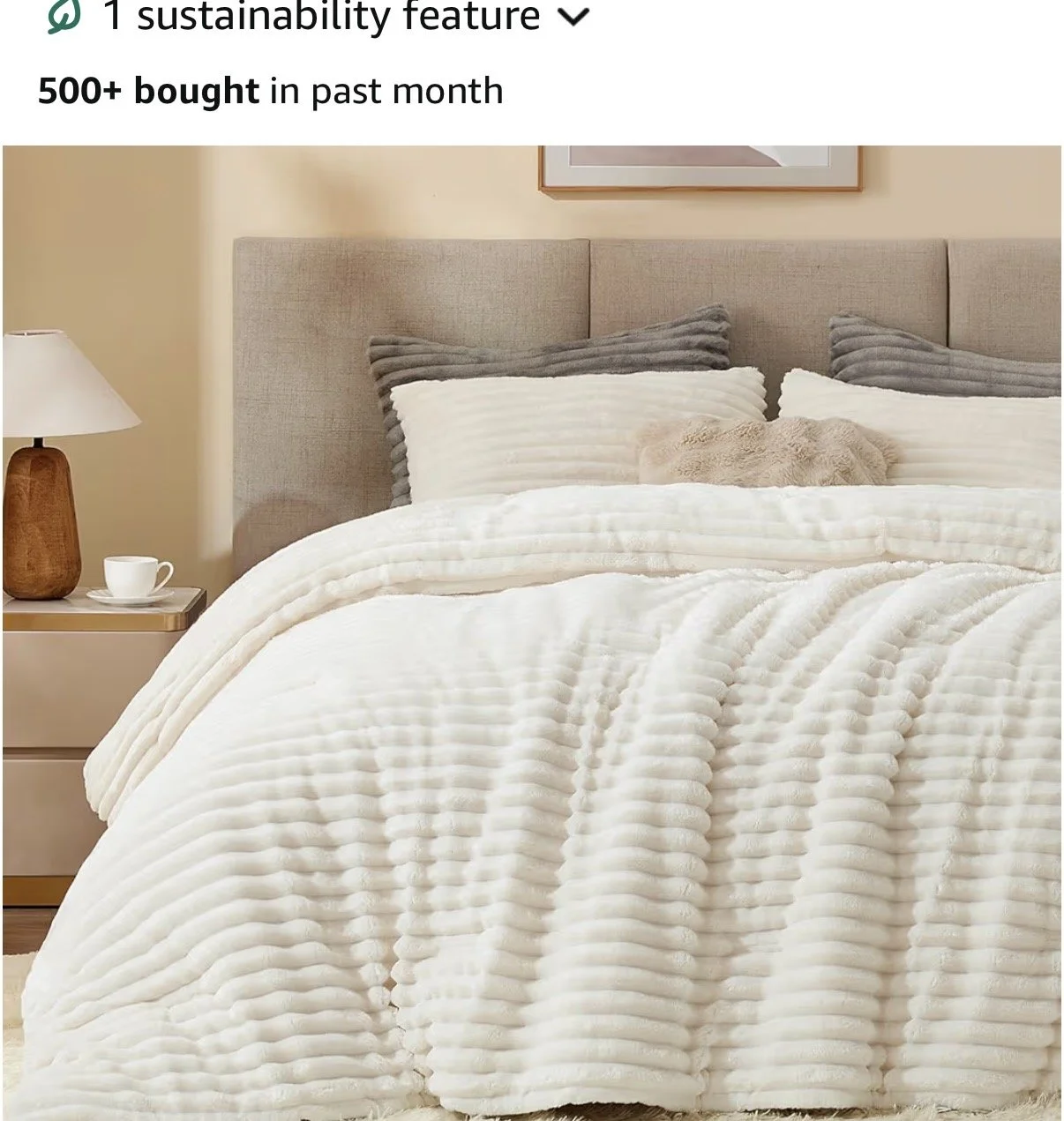  Cream colored fuzzy bedding in a tone on tone textured stripe.  