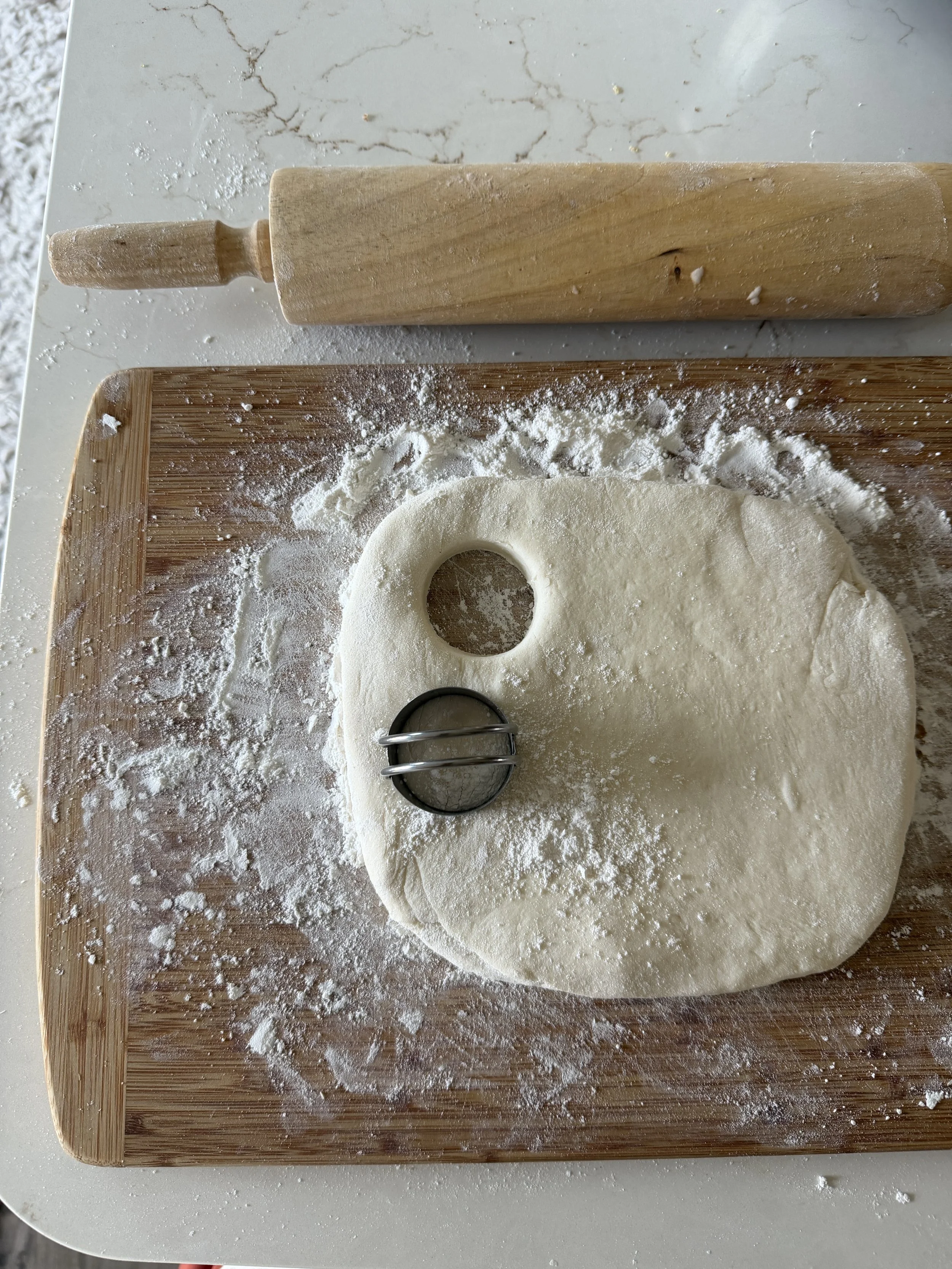 Cutting biscuits with a tiny biscuit cutter