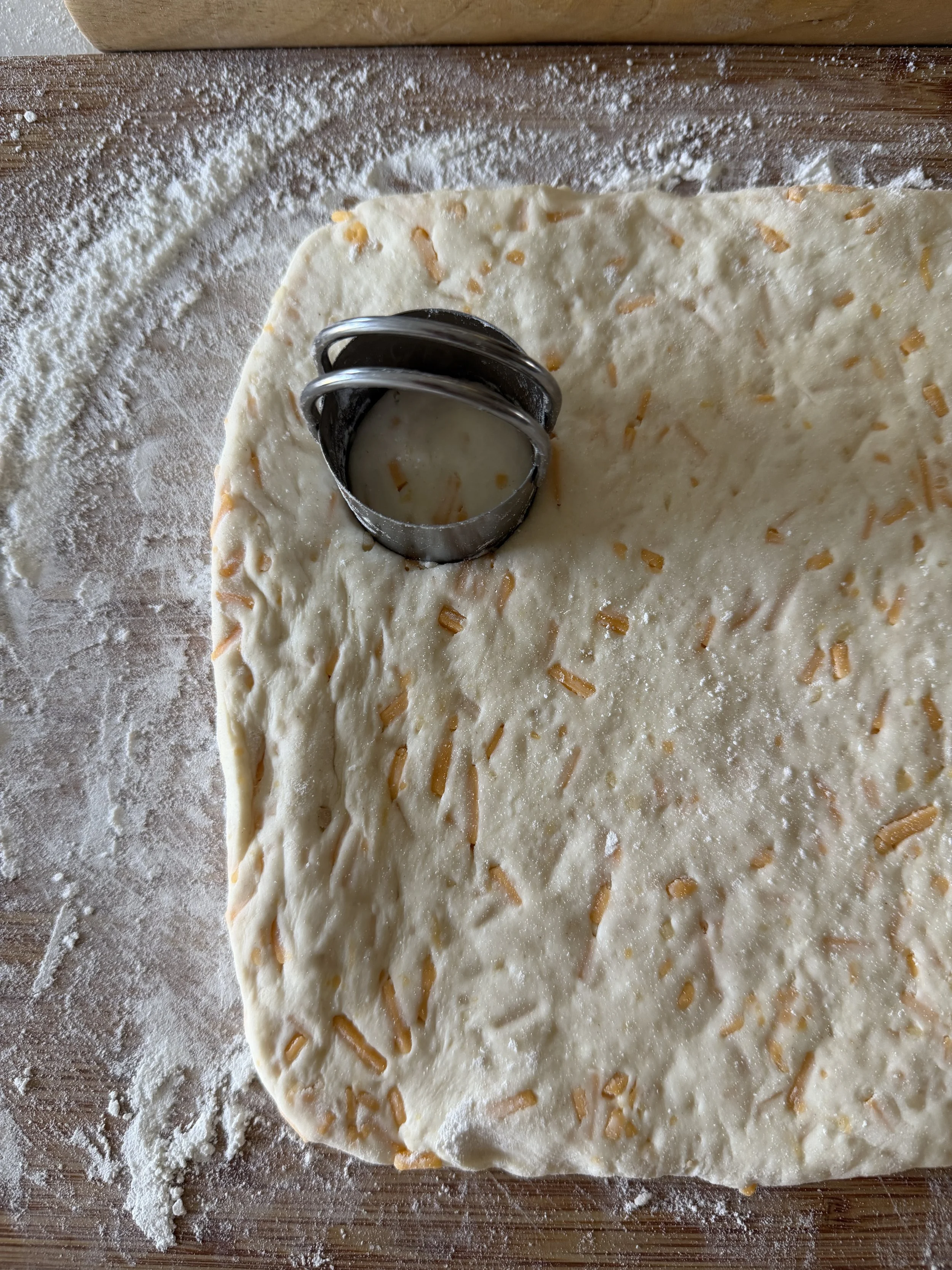 Cheddar garlic dough rolled out