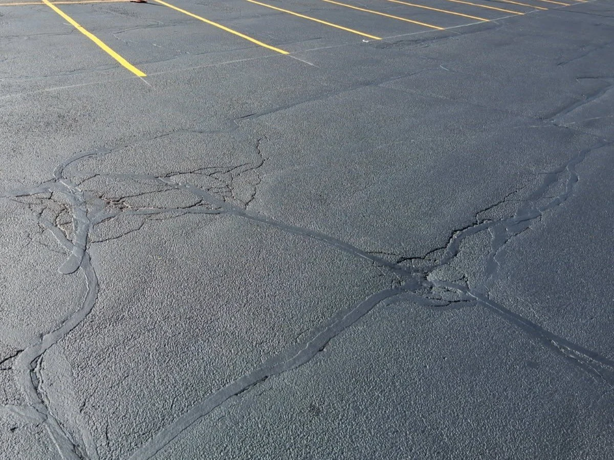 Asphalt with crack fill and seal coated