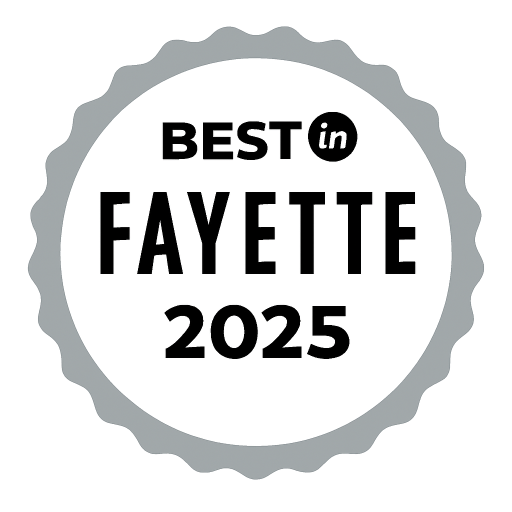 A badge with a silver scalloped border, containing the text 'Best in Fayette 2025' in black letters.