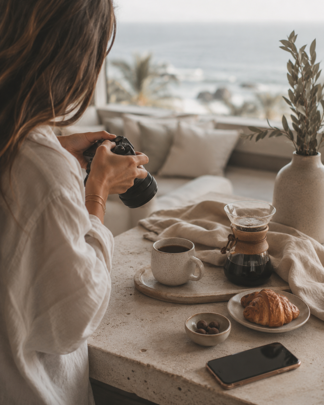Shooting a café spread against an ocean view — content production by OLA