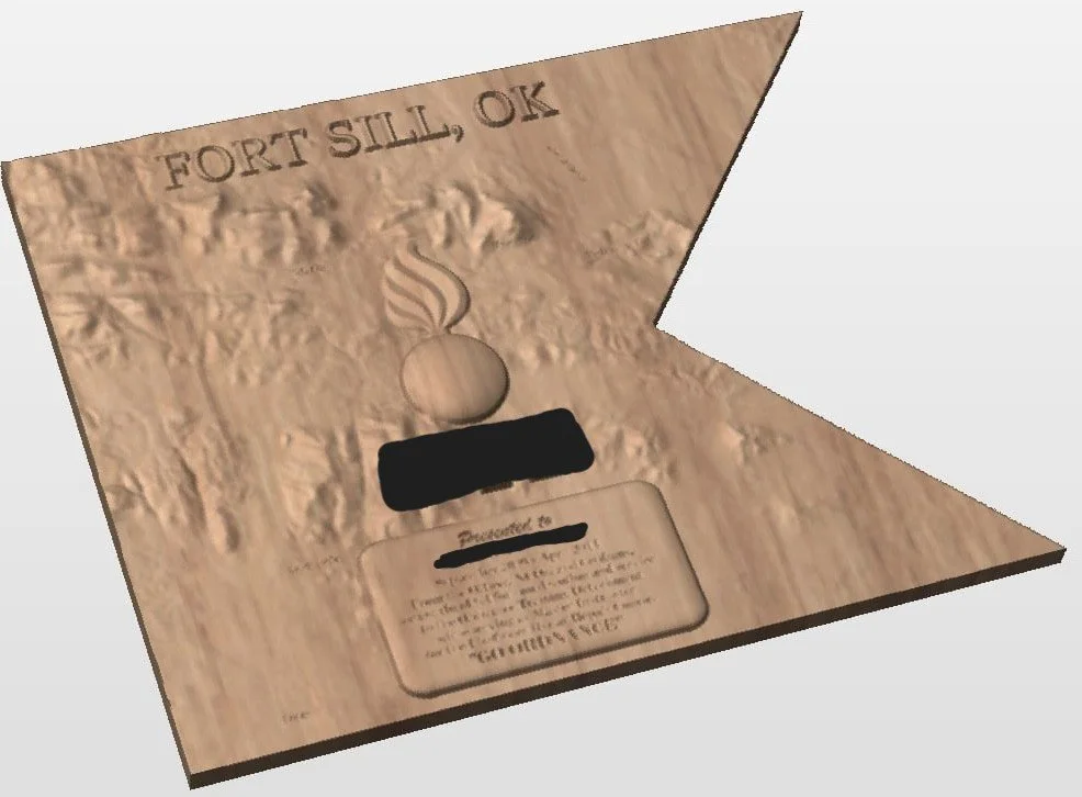 Custom guidon-shaped wooden military plaque featuring “Fort Sill, OK,” a carved flaming bomb emblem, terrain details, and a personalized dedication. Crafted by Wichita Mountain Woodworks in Lawton, Oklahoma.
