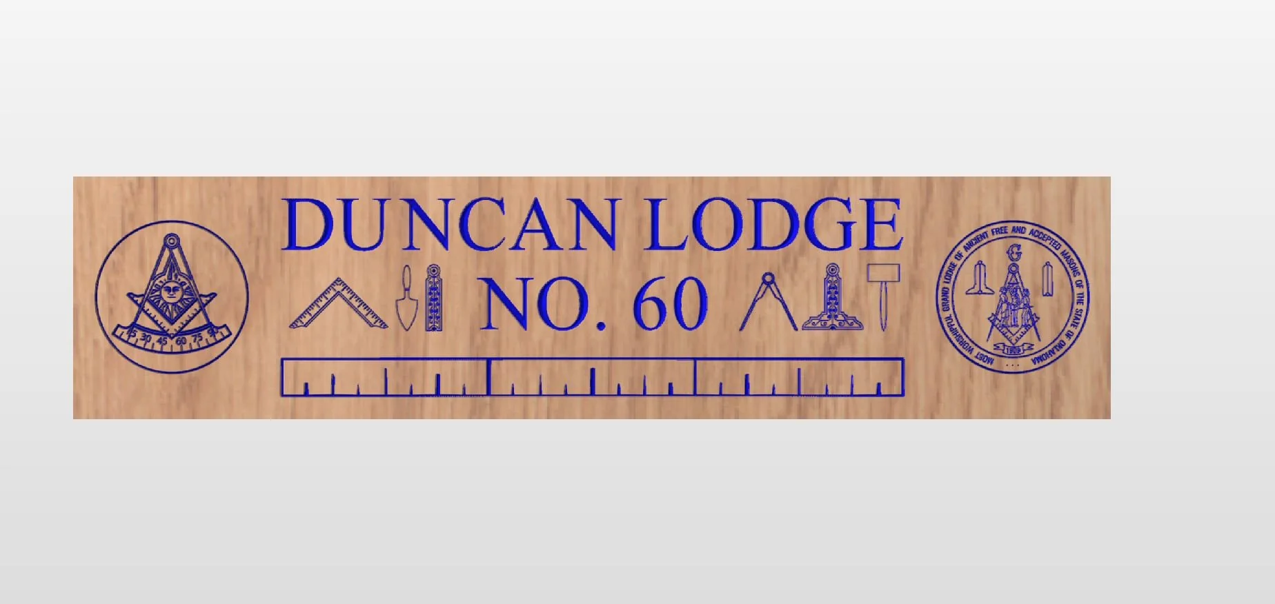 A wooden carpenter's ruler with a blue print overlay of the Duncan Lodge No. 60 emblem, including Masonic symbols and tool icons.