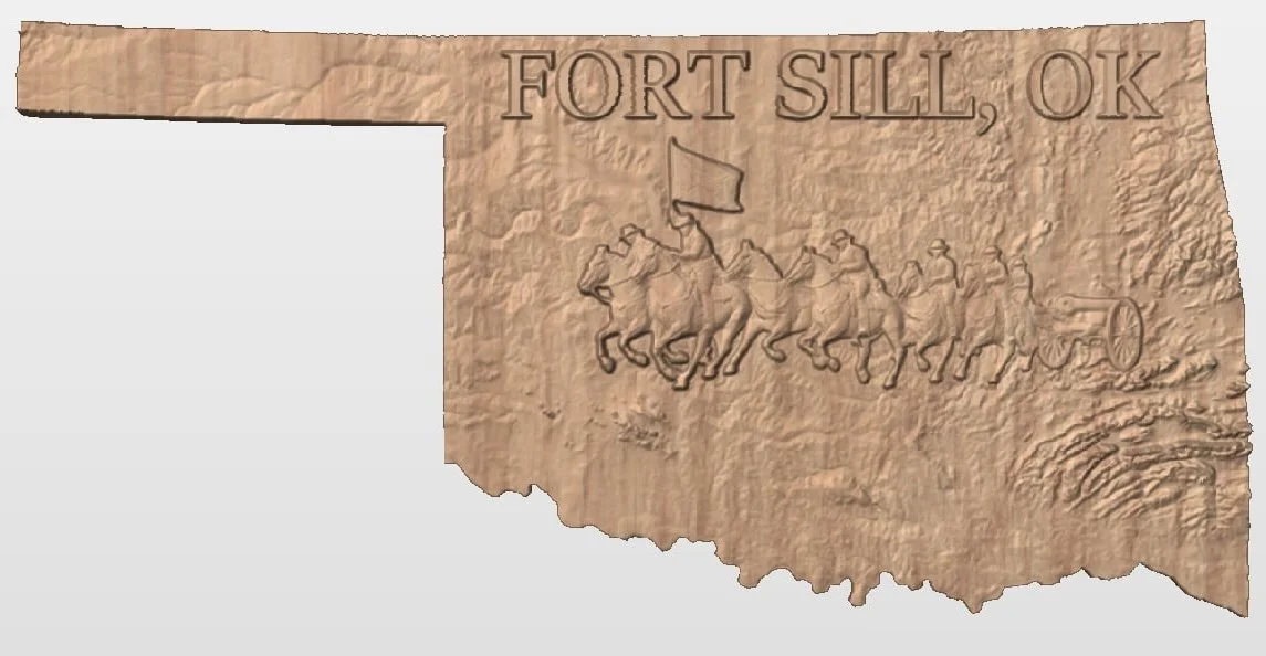 Wooden plaque features the text "Fort Sill, OK", a line of marching soldiers, and a cannon, with textured wood background.