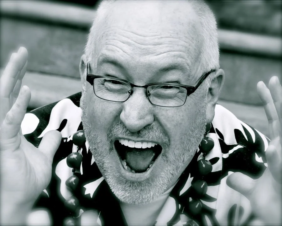 Kevin Wanzer in black and white, laughing