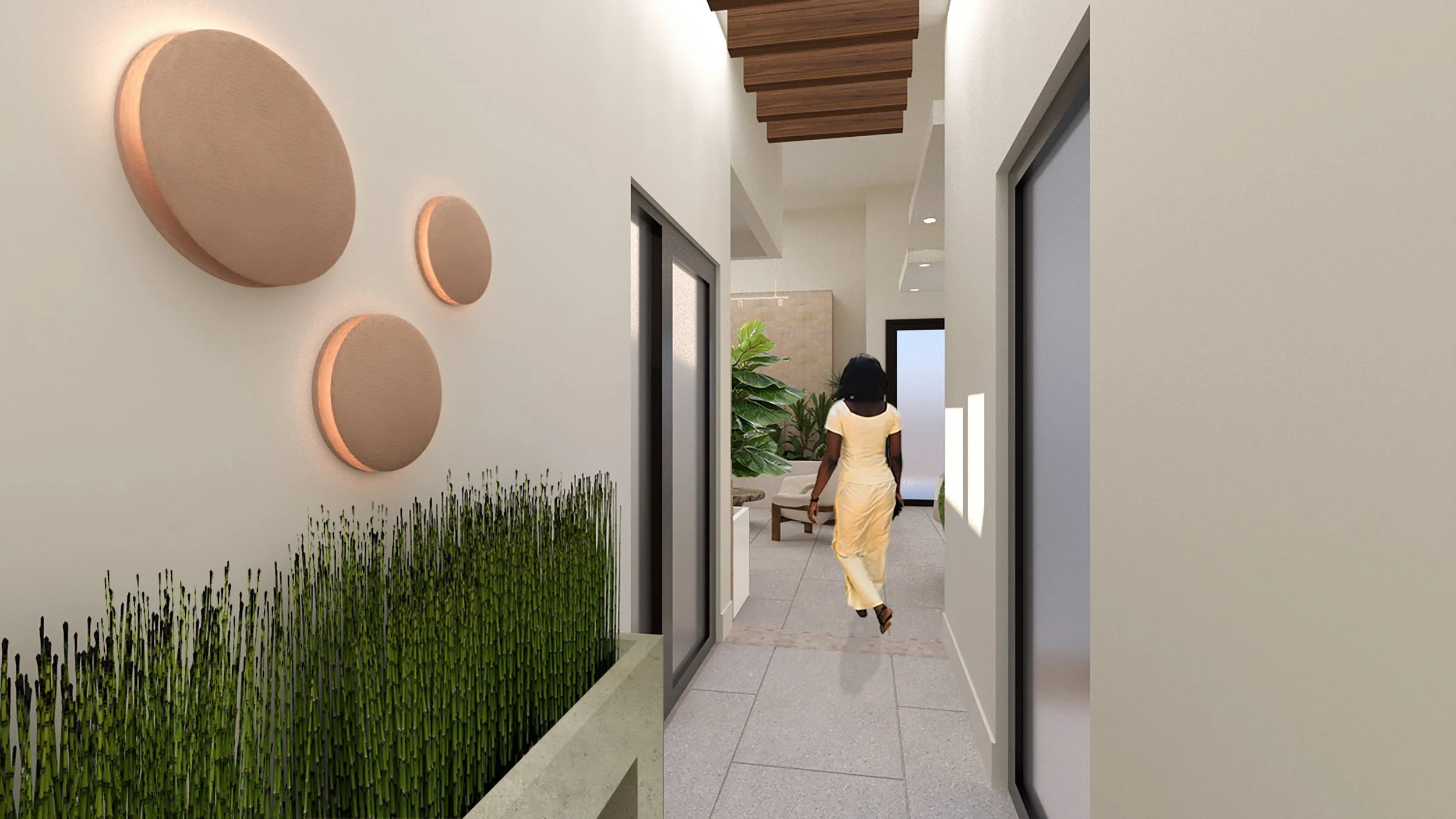 A hallway interior with a woman walking away, plants along one wall, decorative circular wall art, and a wooden ceiling feature.
