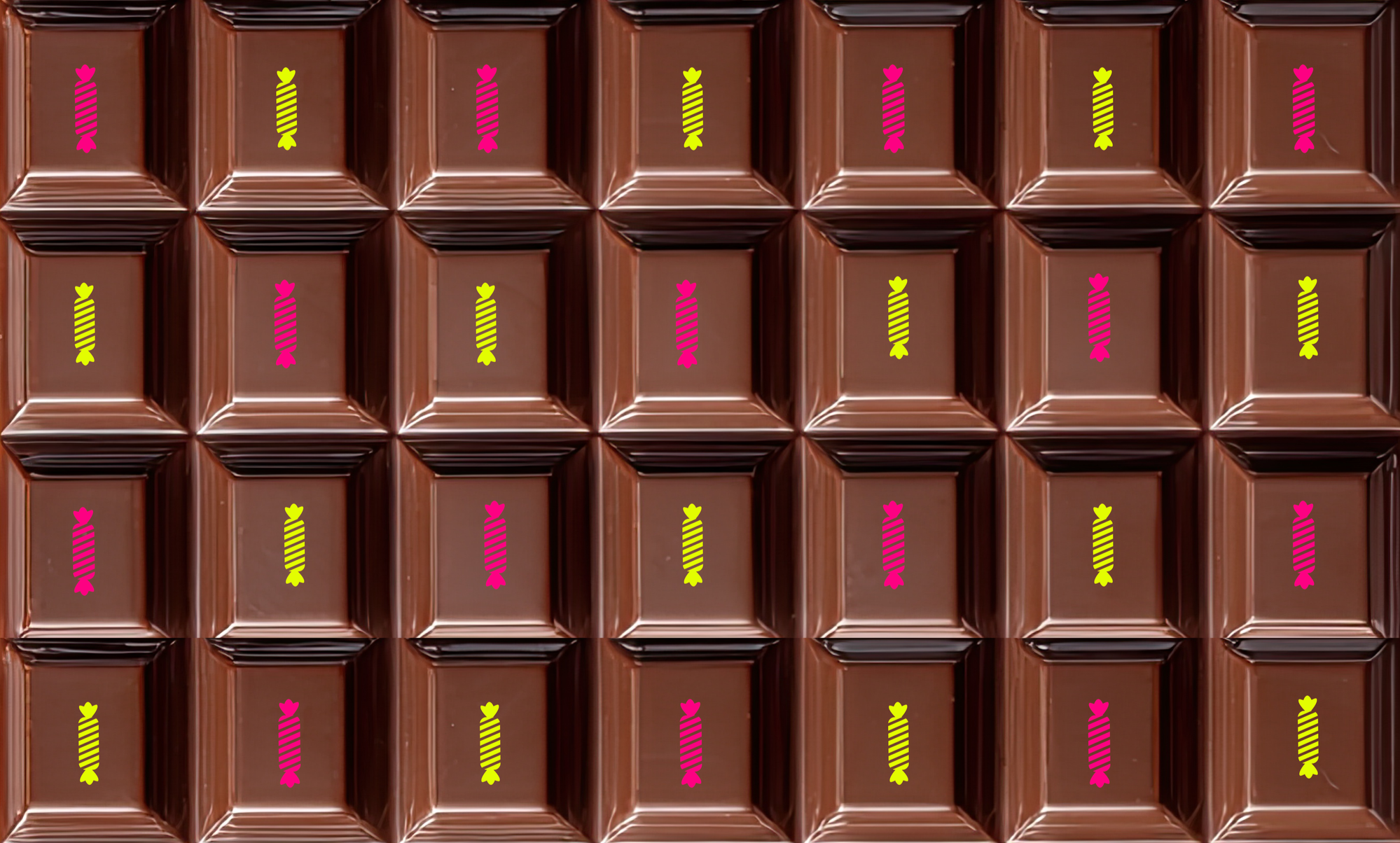 A grid of milk chocolates with colorful candy wrapper stickers on top, arranged in rows.