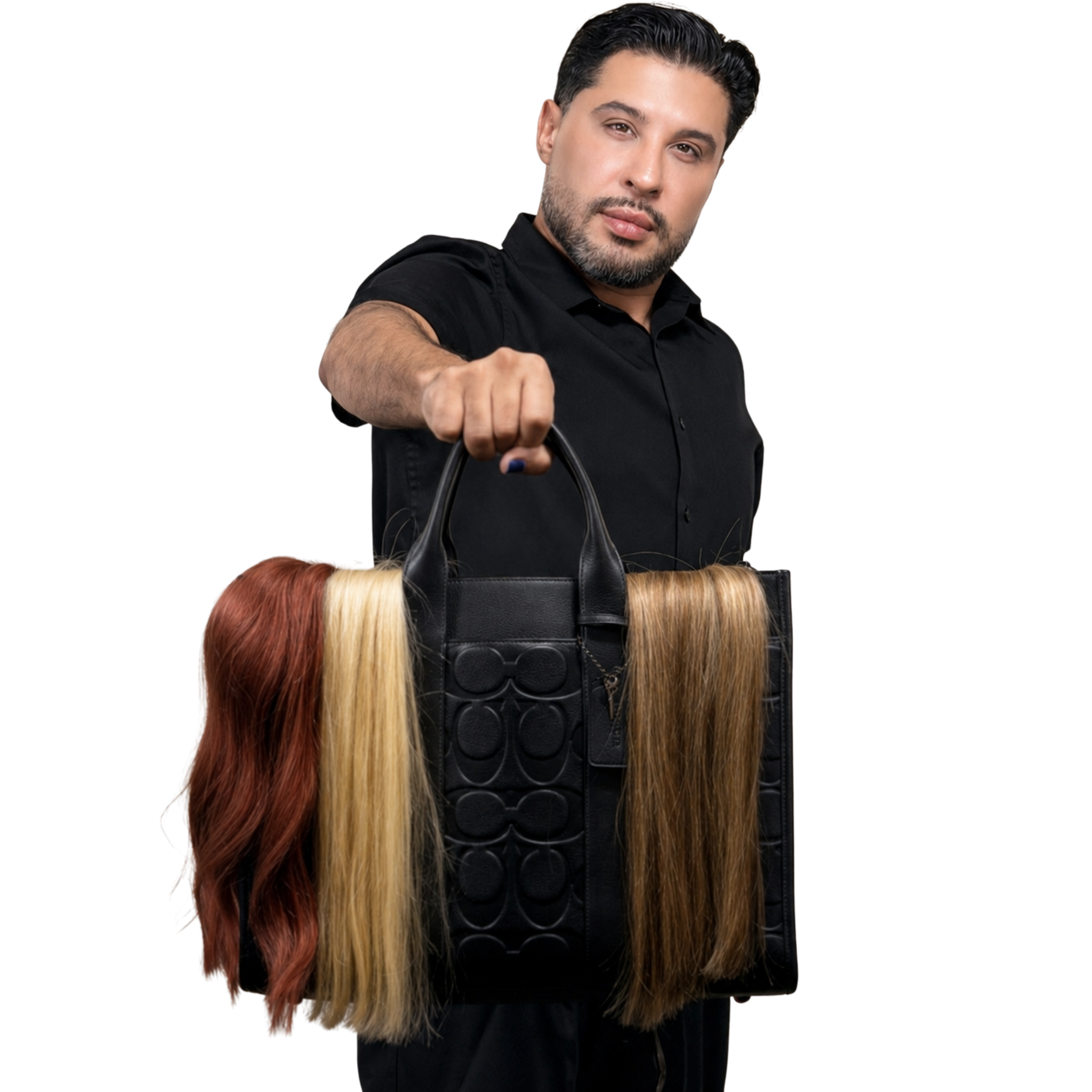 A man with dark hair and beard, wearing a black shirt, is holding a black handbag with multicolored hair attached to it, pointing towards the camera.