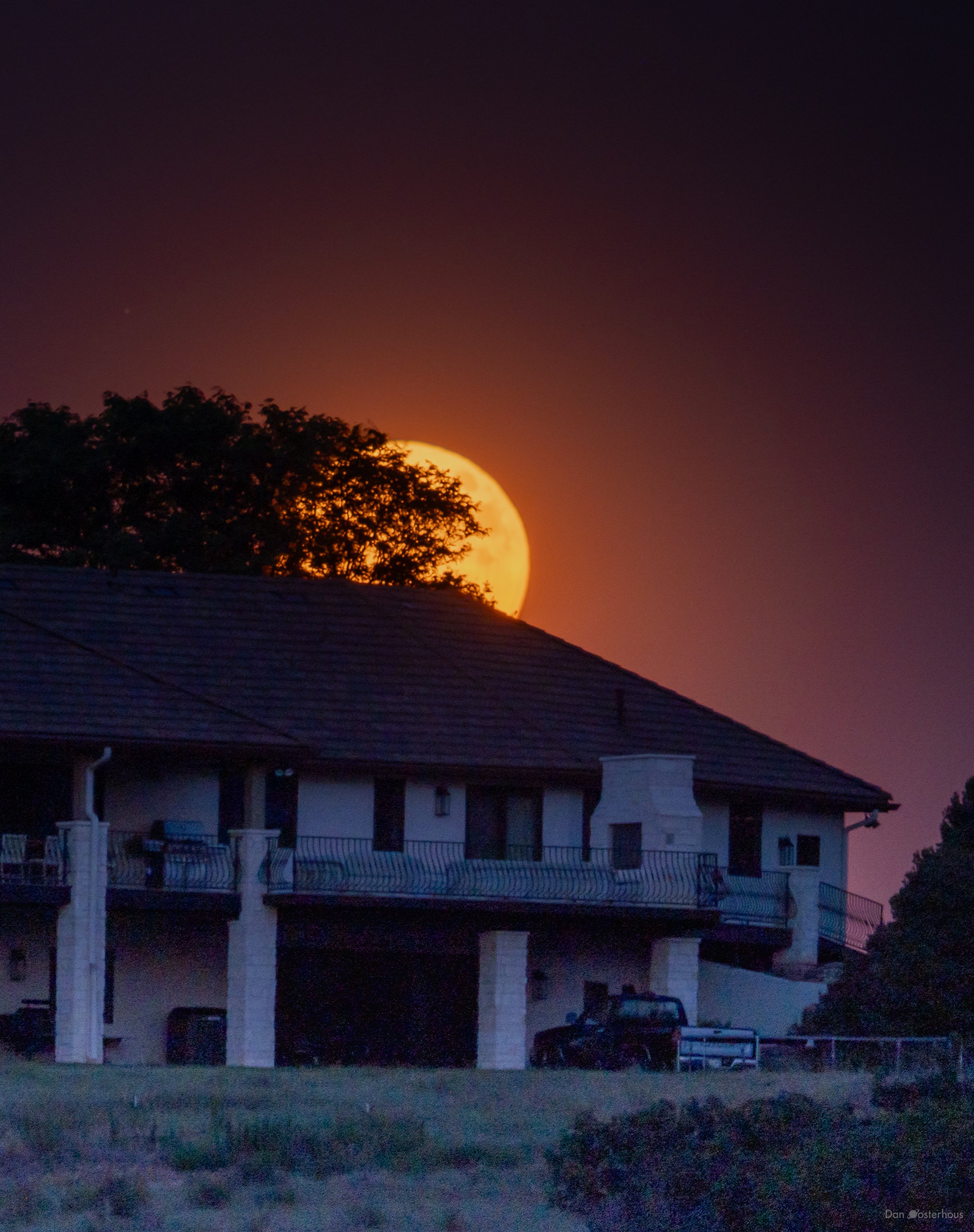 Strawberry moon rise behind home in Sedalia, Co. 29 Jun 2026