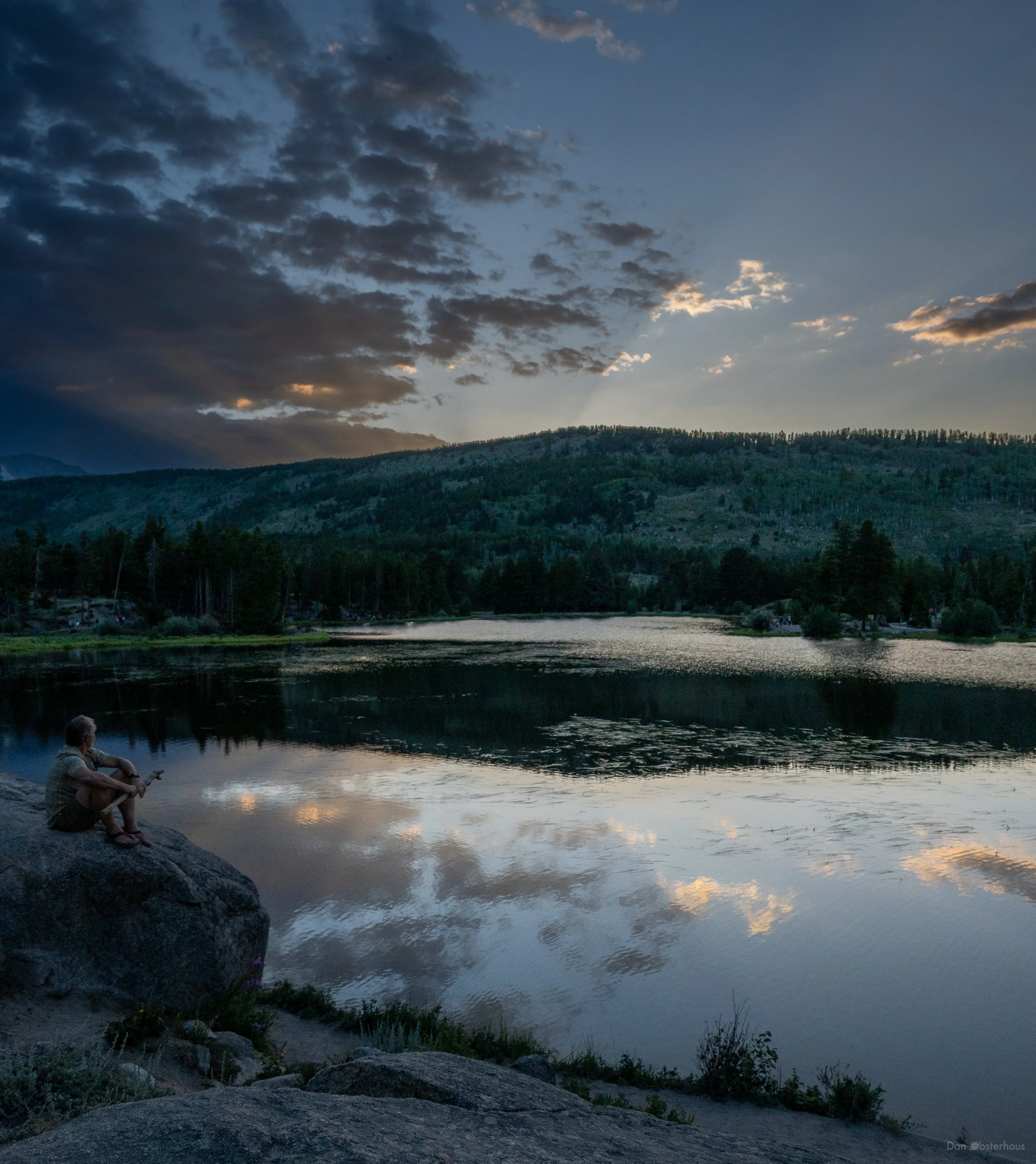 My favorite part of this photo is how the sun's rays split a cloud into light and dark, and this also shows up in the reflection in the lake.  Sprague Lake, RMNP, 18 Jul 2026.
