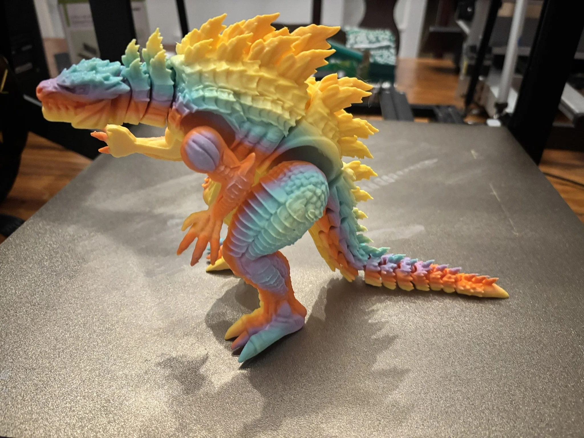 Colorful three-dimensional articulated dragon sculpture with intricate details.