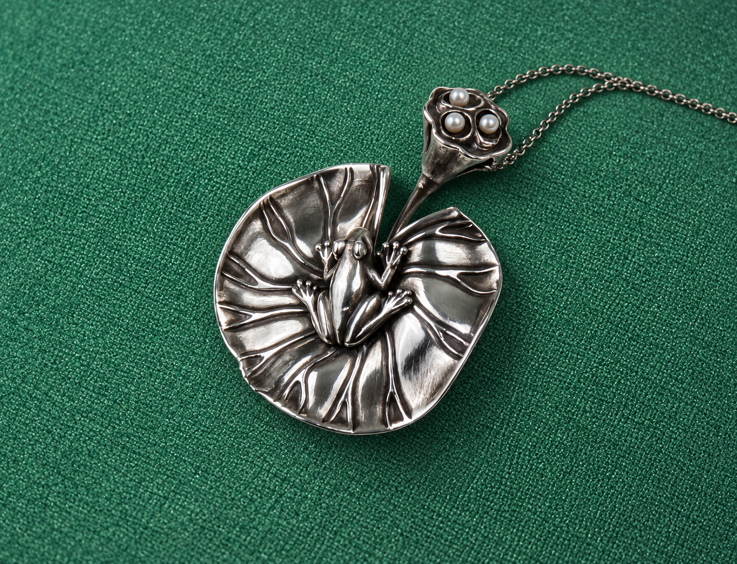 	
Sterling Silver Pendant ‘Lotus and Frog’ by Natalia Chebotar