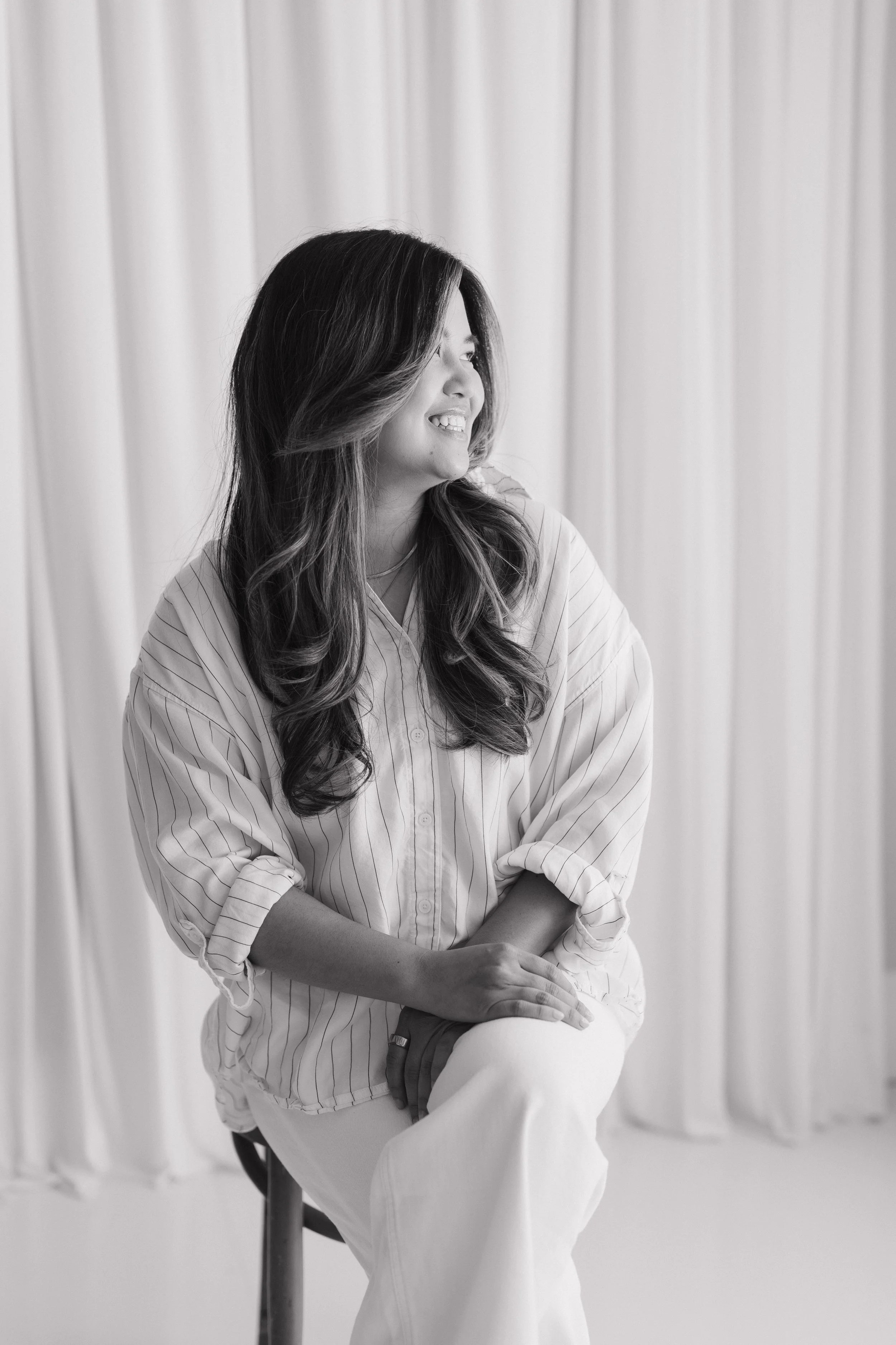 Minh Ngo, anxiety therapist in Texas, smiling in a relaxed moment