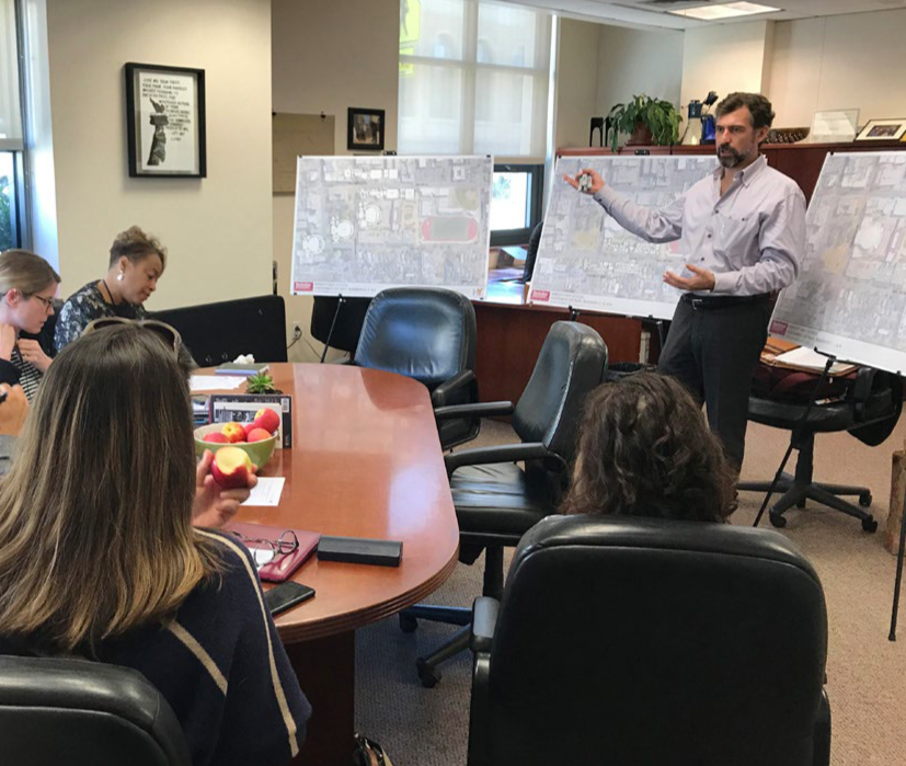 Marcus Hibser discussing needs and priorities with a site comittee