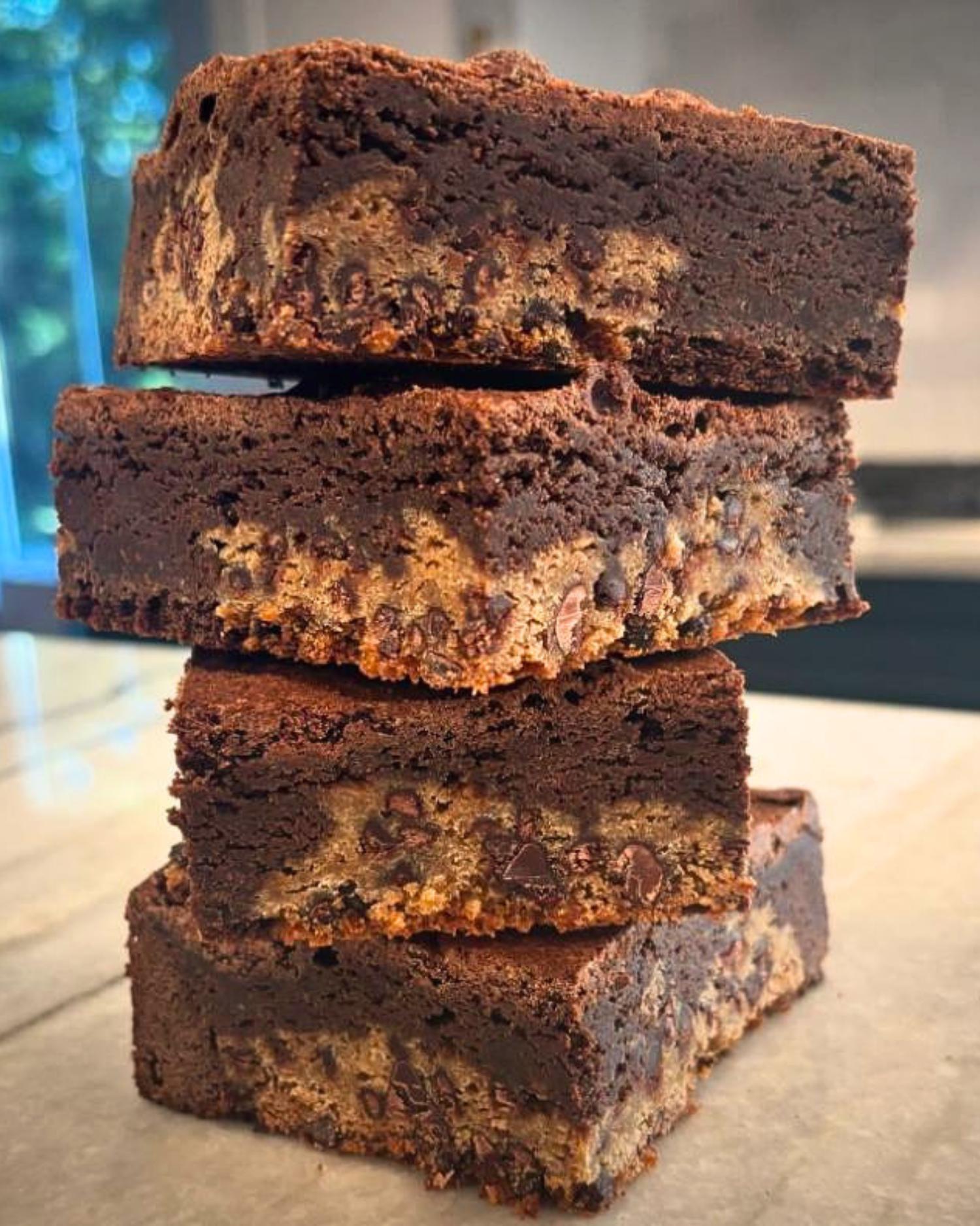 Stack of five chocolate brookies.