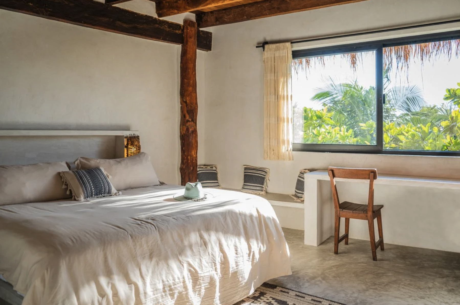 Bed in a Double Beach View Room 3.png