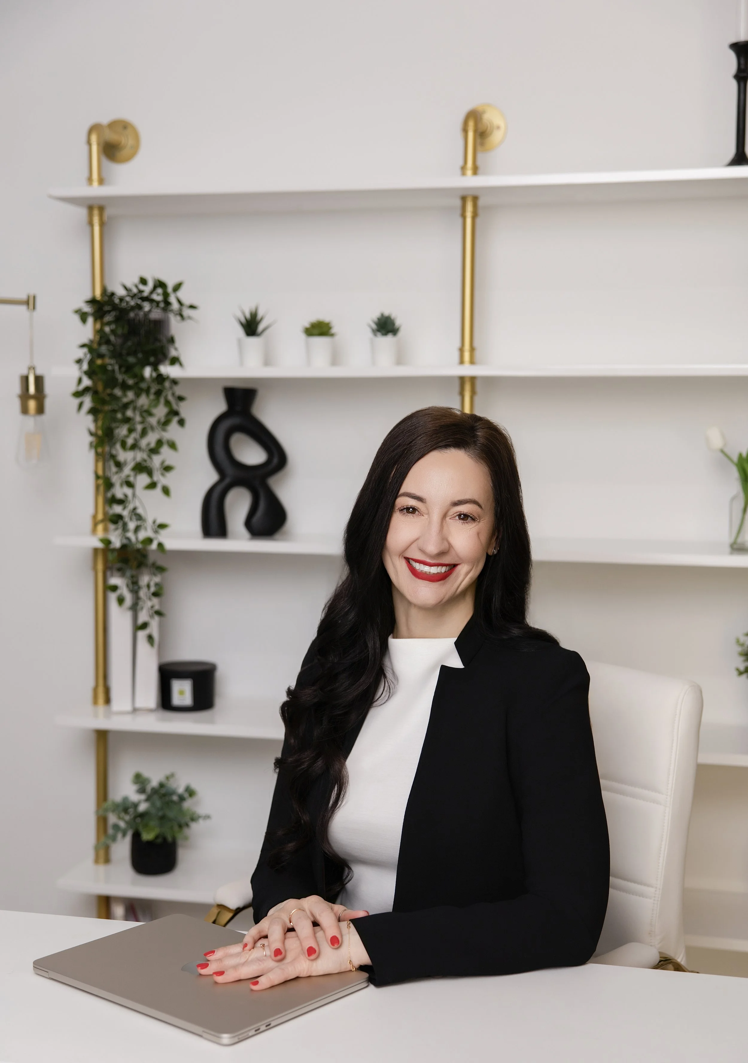 Executive coach Bernadette McMechan seated at her desk