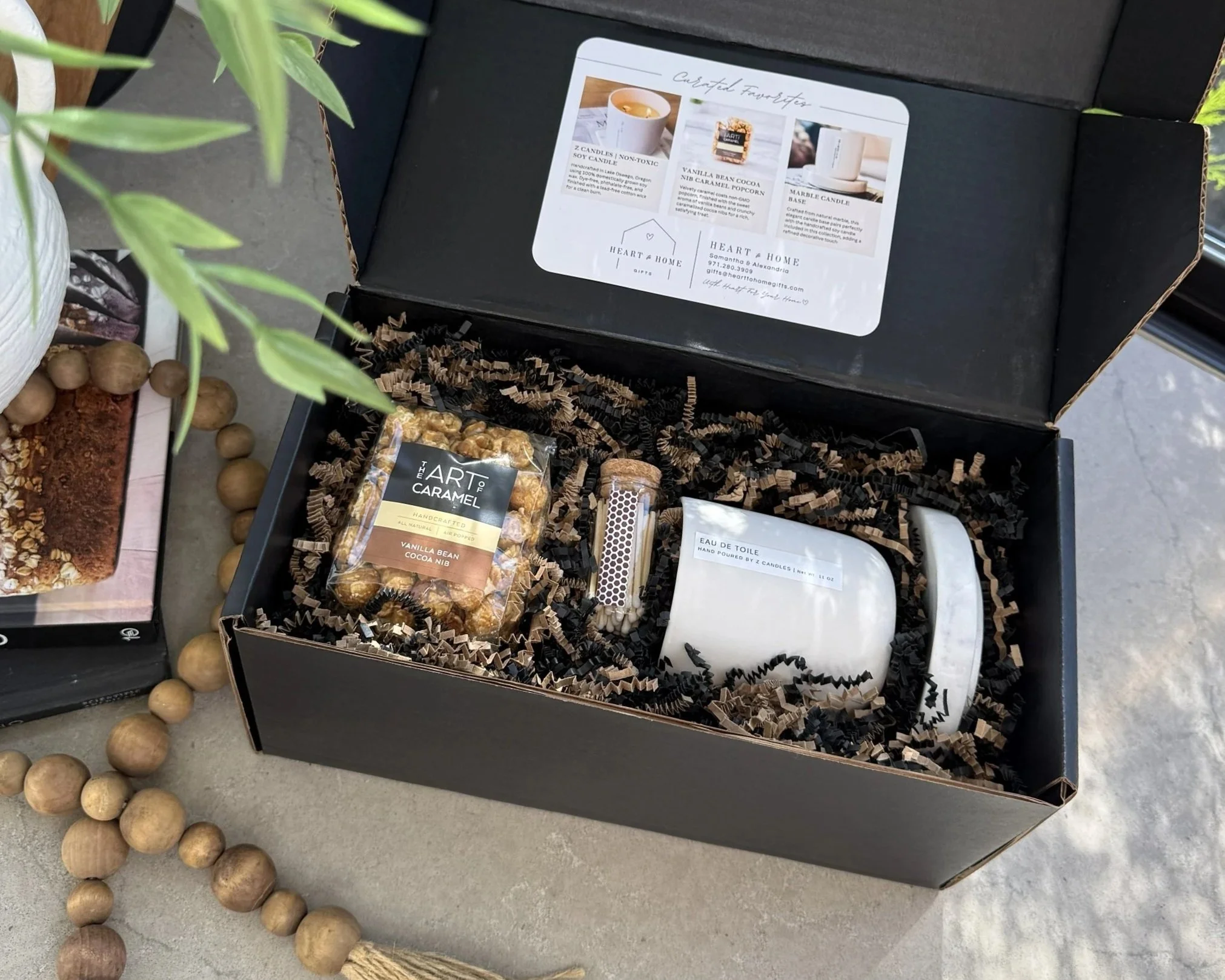 Elegant real estate closing gift featuring luxury candles, fragrance, and personalized handwritten note by Heart to Home Gifts