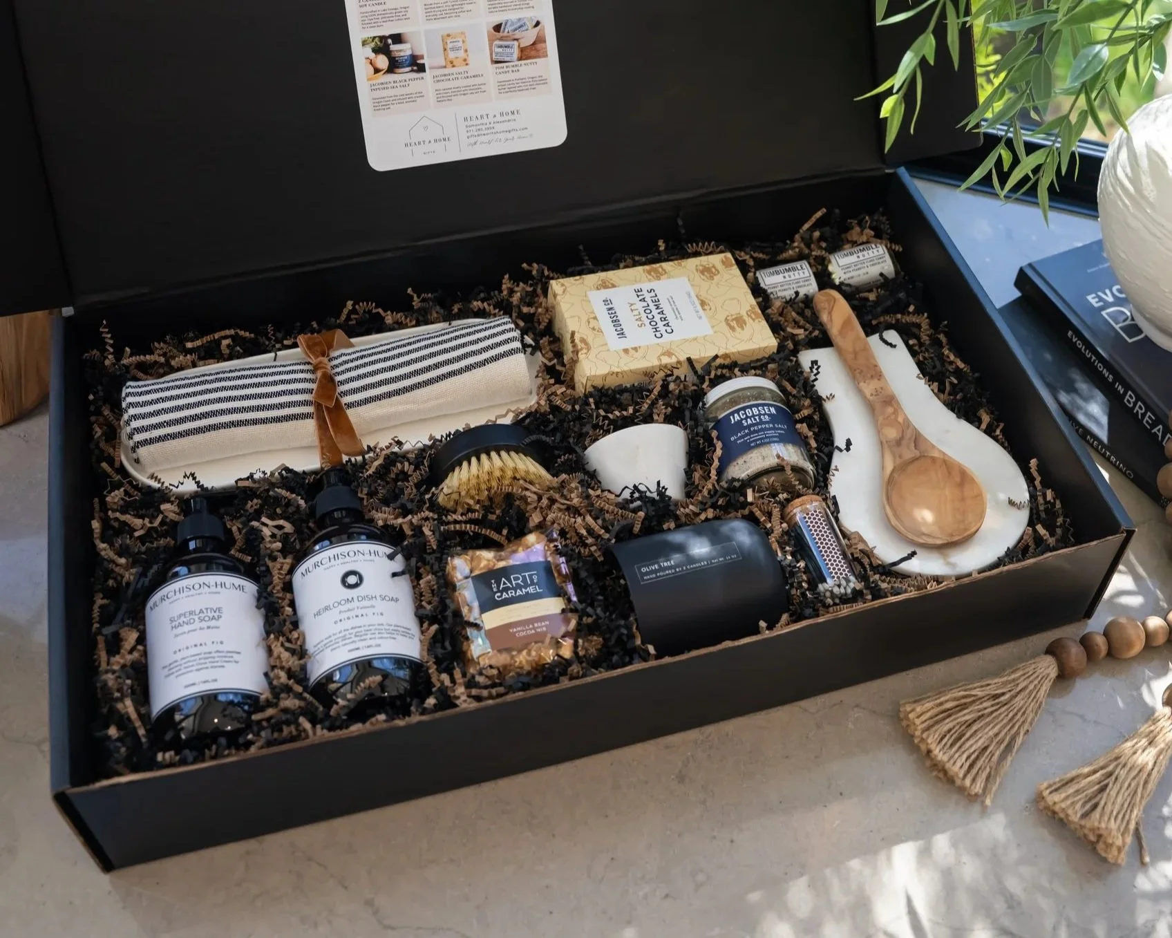Luxury realtor closing gift box with premium self-care products, artisan cheese board, and hand soaps by Heart to Home Gifts Portland