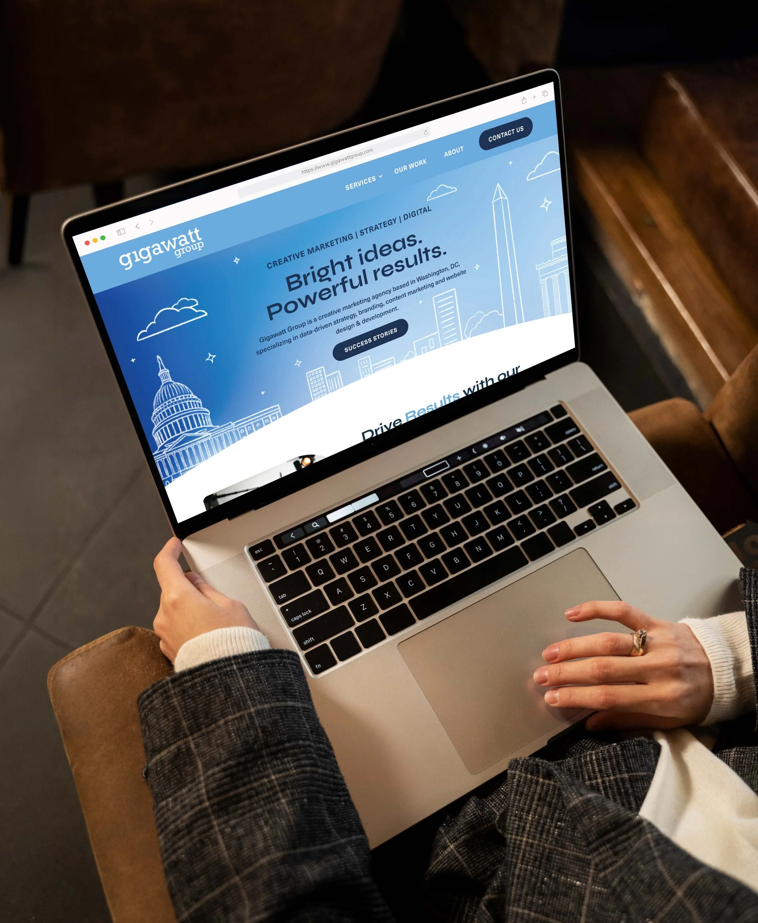Yasmine Design Co. – Gigawatt Group website redesign UI/UX project displayed on a laptop mockup, showing a blue Washington DC-themed homepage with the headline "Bright ideas. Powerful results."