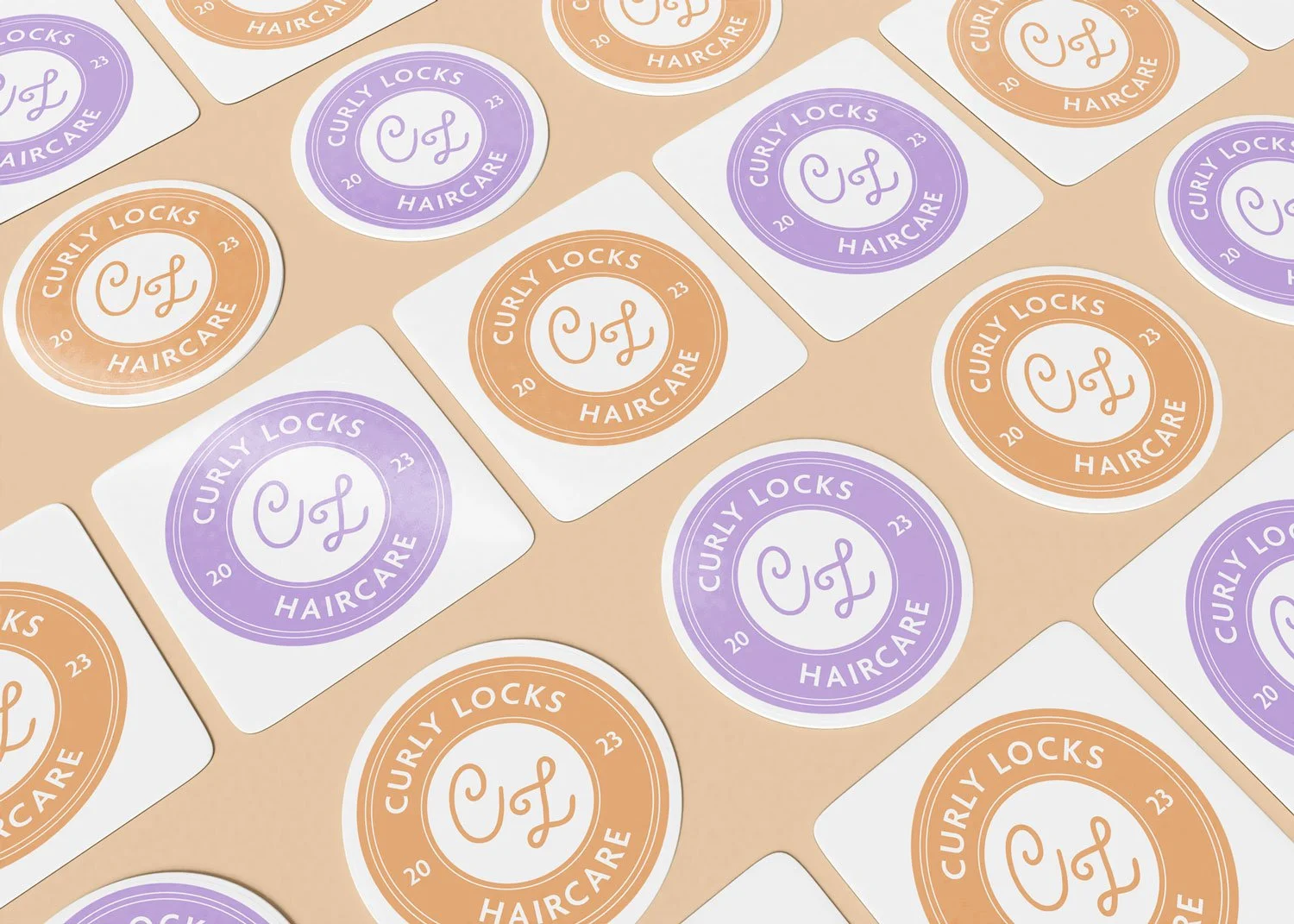 Curly Locks Haircare brand sticker design mockup featuring circular badge logo with CL monogram in alternating lavender and golden orange colorways scattered across a tan background.