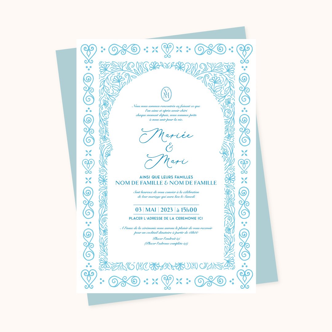 Sidi Bou Said-inspired Tunisian wedding invitation design in powder blue featuring an ornamental hand-drawn floral and arabesque arch border frame with elegant calligraphy script, shown with a matching blue envelope backing.