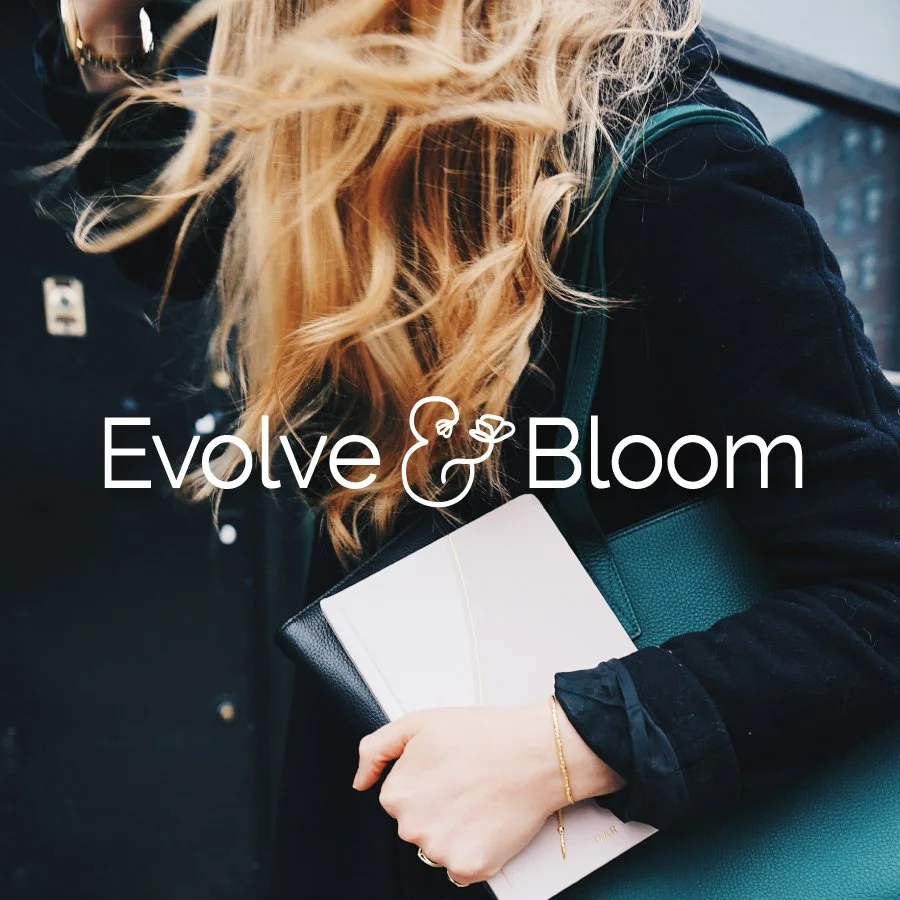 Evolve and Bloom brand logo design overlaid on a lifestyle photography background of a woman with flowing blonde hair carrying a notebook and leather tote bag.