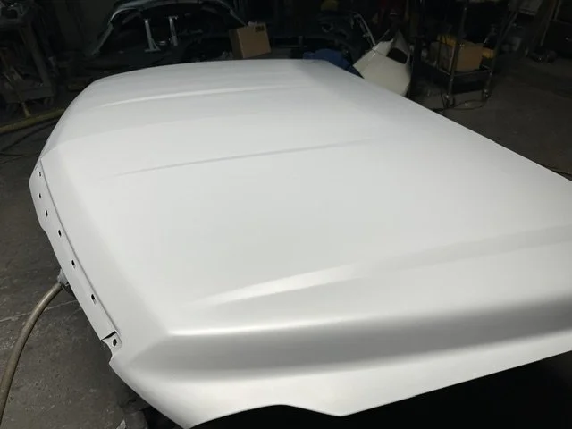 Hood paint refinish on Escalade 4