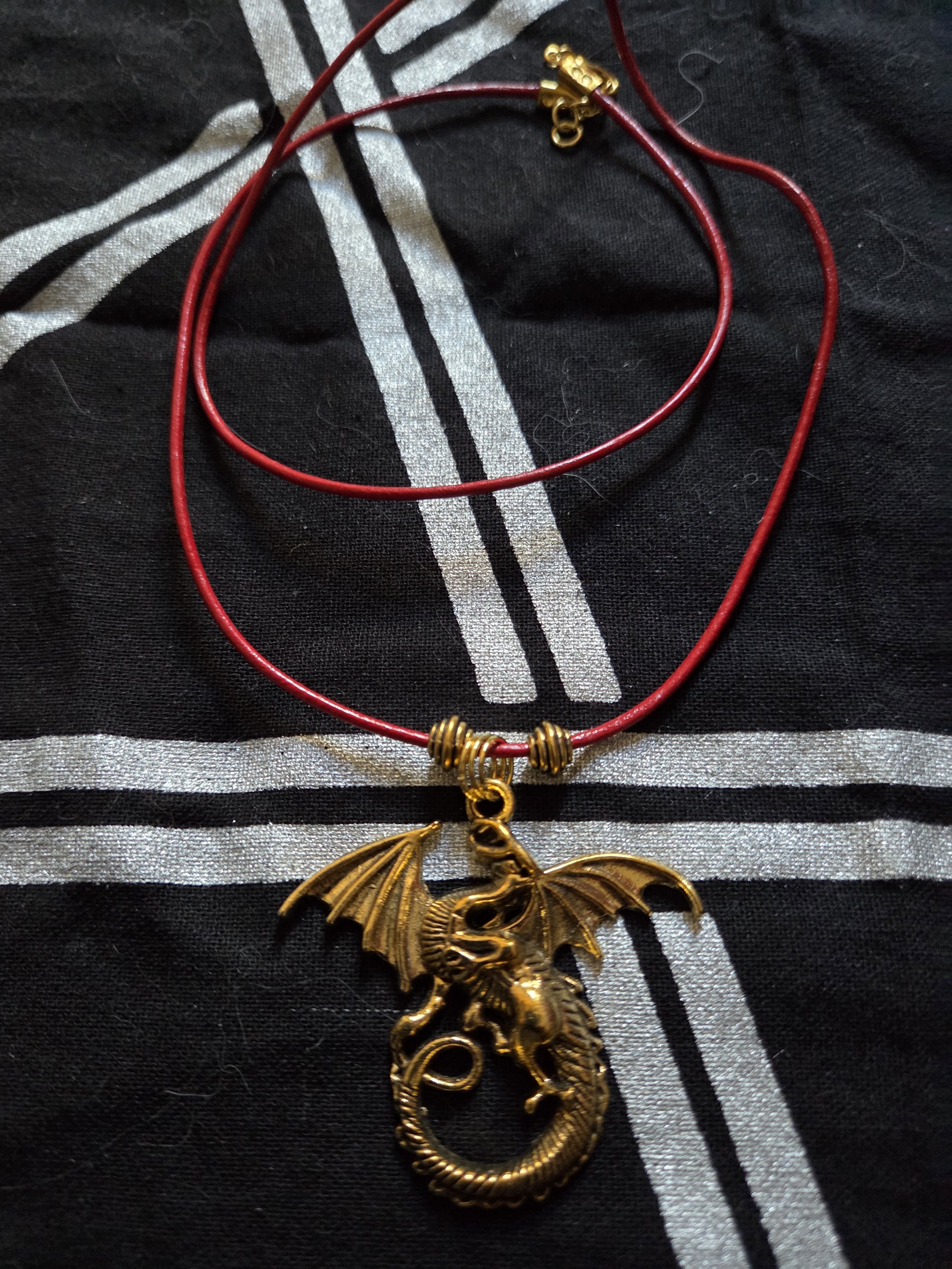 Pendant and leather cord