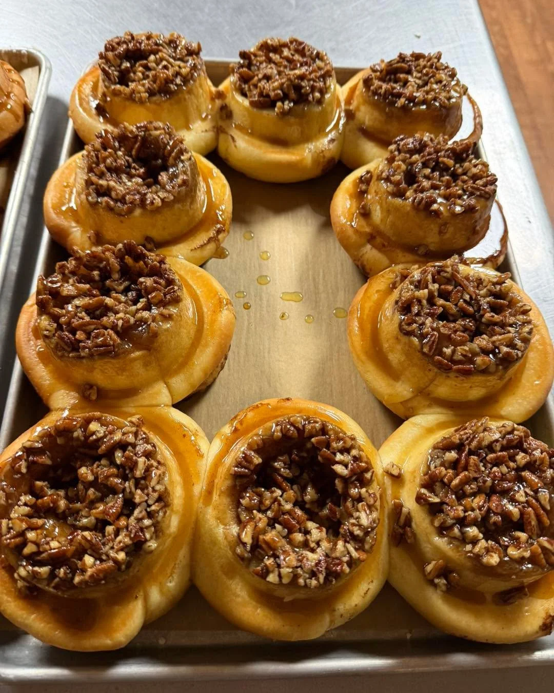 A Little Something Special in Every Sticky Bun 🍯

We believe the best baked goods begin with the best ingredients!

Our Pecan Sticky Buns are made with wild, native Missouri pecans from Missouri Northern Pecan Growers. 😳 Grown naturally in the rich