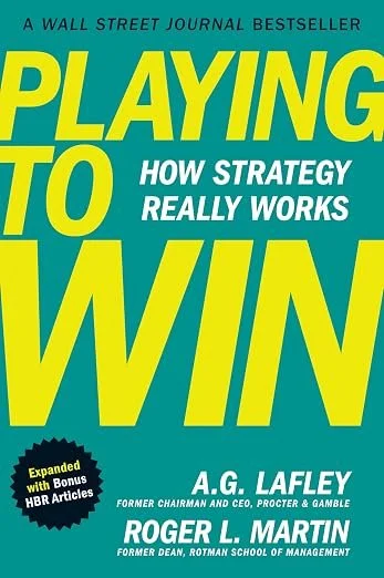 Book cover for 'Playing to Win: How Strategy Really Works' by A.G. Lafley and Roger L. Martin, with a teal background and large yellow and white text.