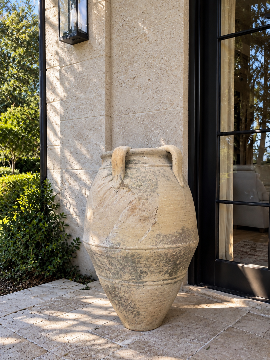 Weathered Terracotta Amphora by the Entryway.png