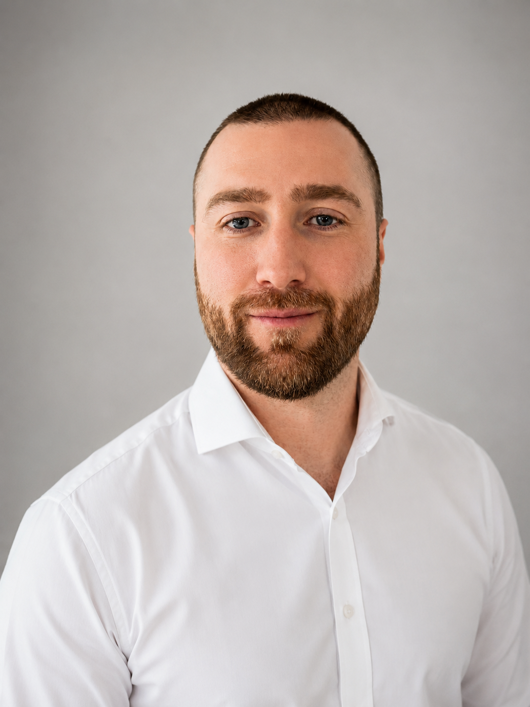 Tim Gibbs, founder of Gibbs Parent Consulting, in a professional portrait.