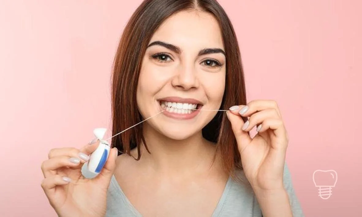© Implant Dentist Sydney Dental Implant Surgery Procedure flossing.jpg