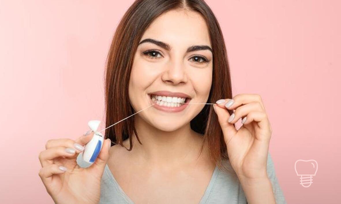 © Implant Dentist Sydney Dental Implant Surgery Procedure flossing.jpg