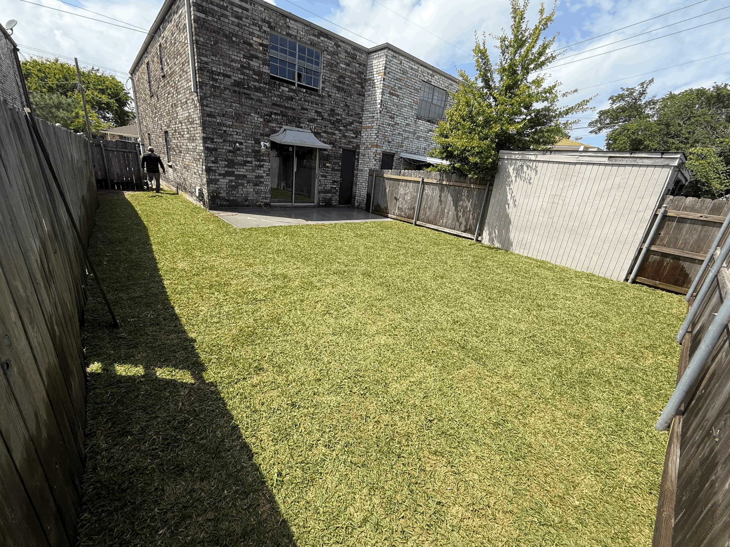 Backyard patio complete with Landscaping