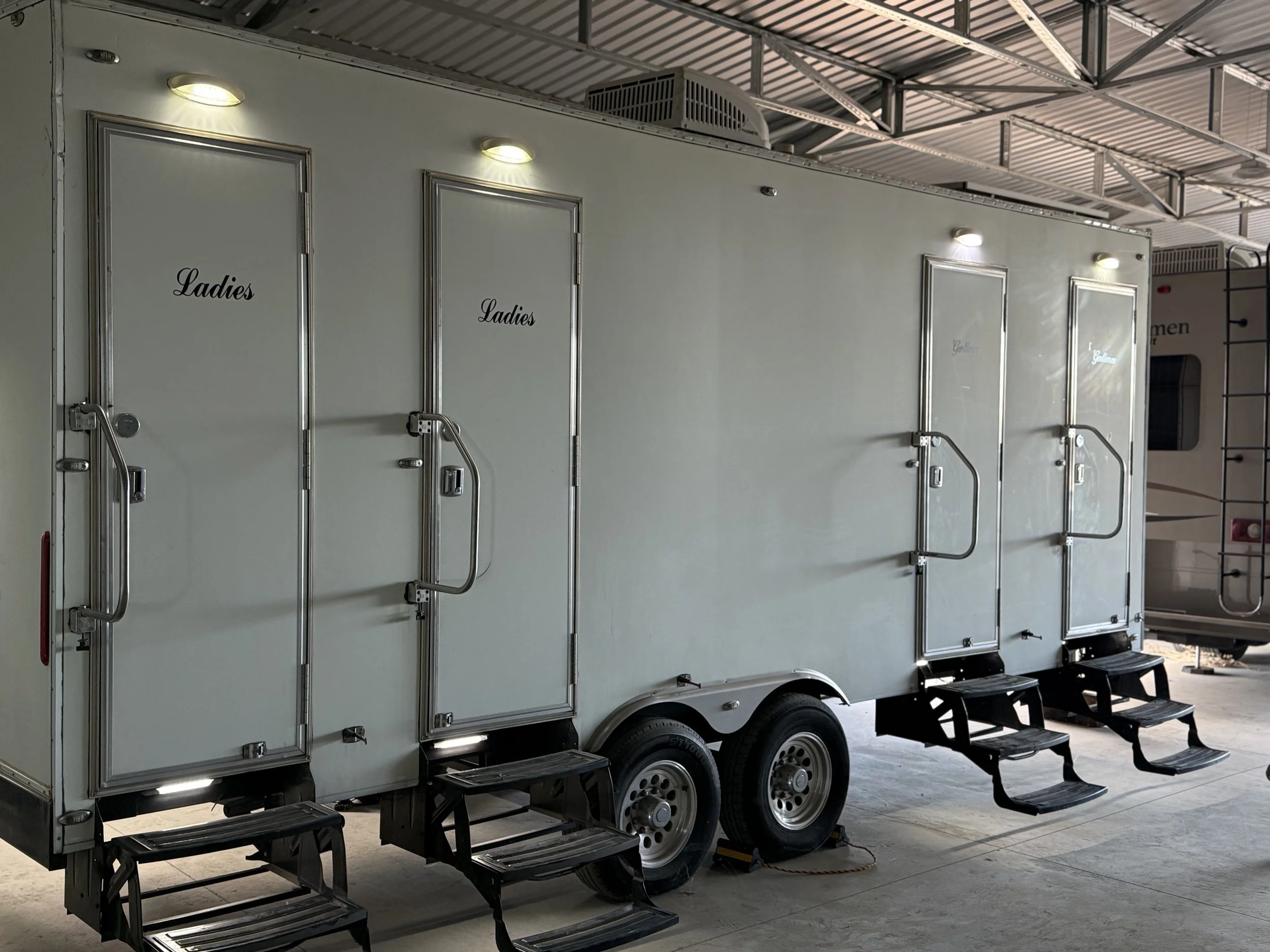 Exterior of luxury restroom trailer rental for weddings and events in the Antelope Valley