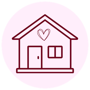 A simple line drawing of a house with a heart on the front, a door, and two windows, all inside a circular frame.