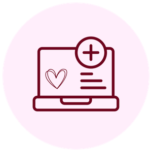Computer monitor displaying a heart and a medical plus sign