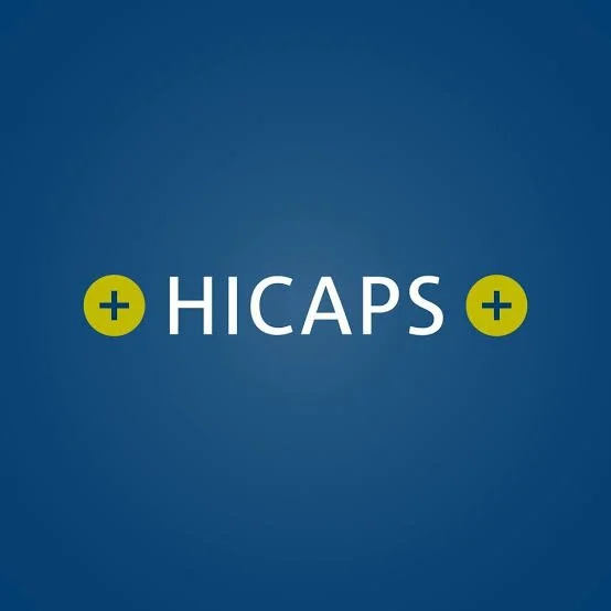The logo of HICAPS with the name in white capital letters, flanked by yellow circles with plus signs, on a blue background.