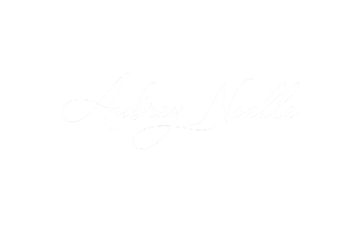 Black background with white cursive text that reads "Aubrey Noelle".