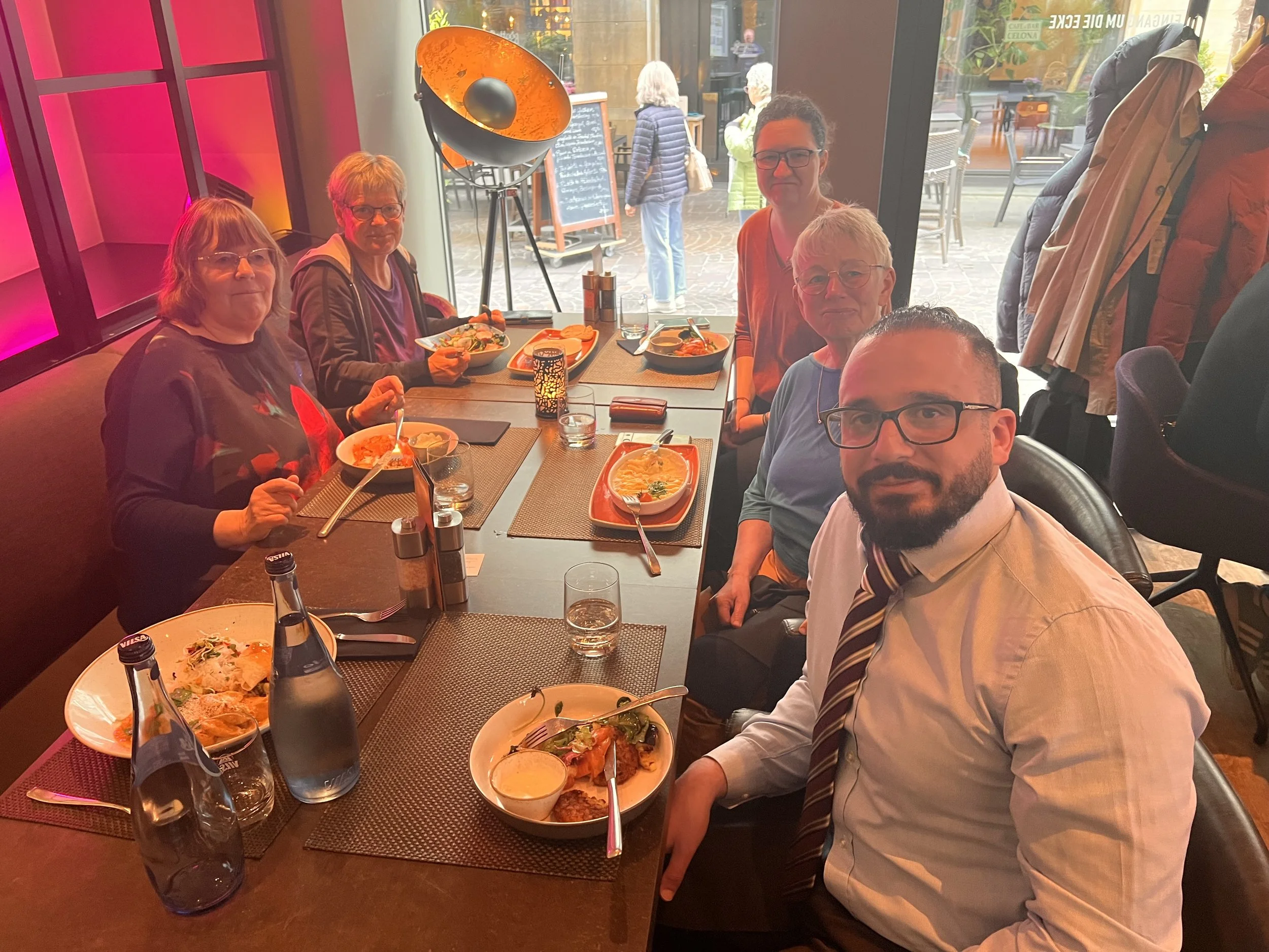 Mahdi Yahya and members of Stiftung die schwelle sharing lunch together during the Bremen Peace Award 2026 week in Bremen, Germany.
