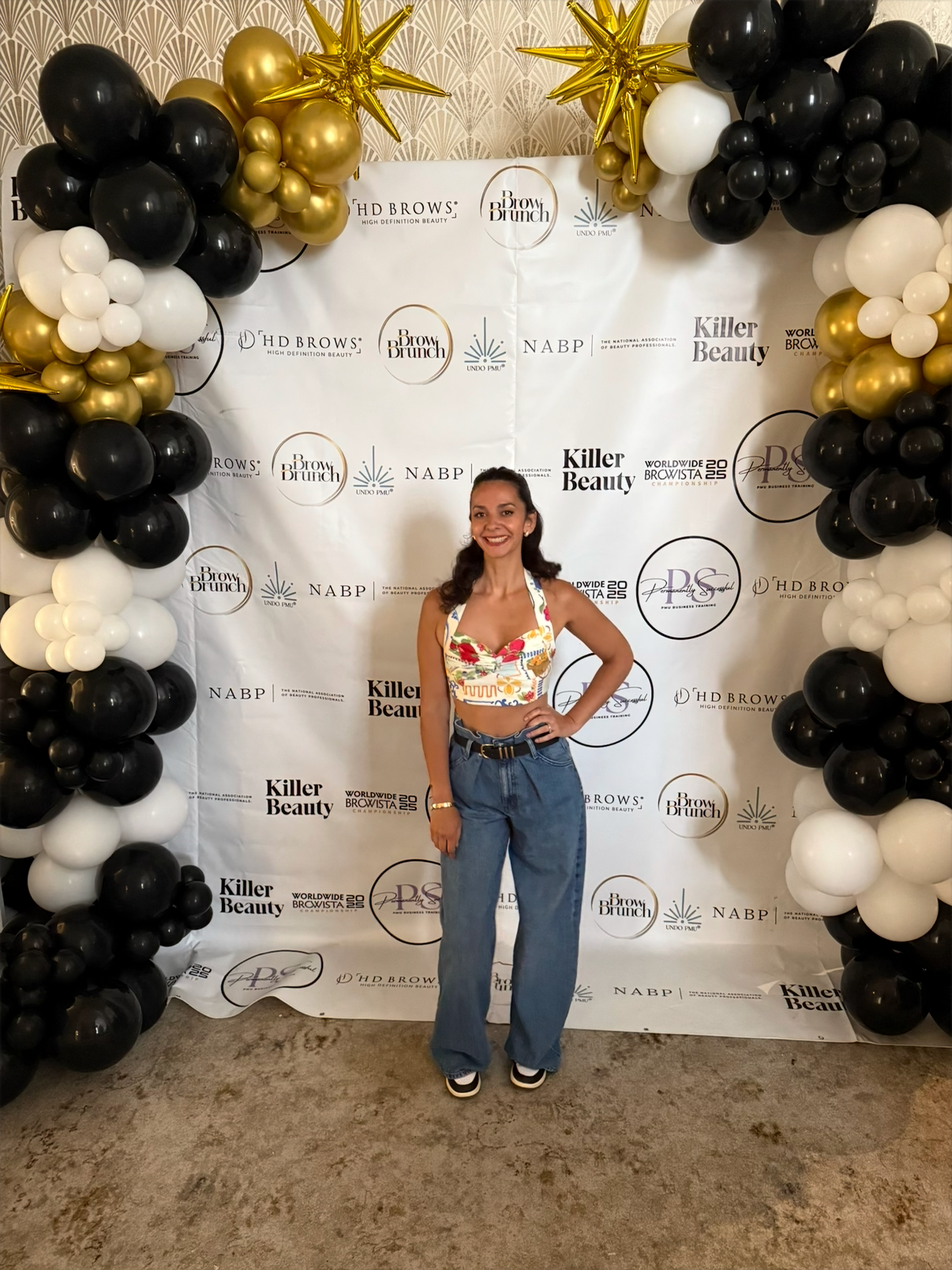 Bella Miguel attending a permanent makeup industry awards event.