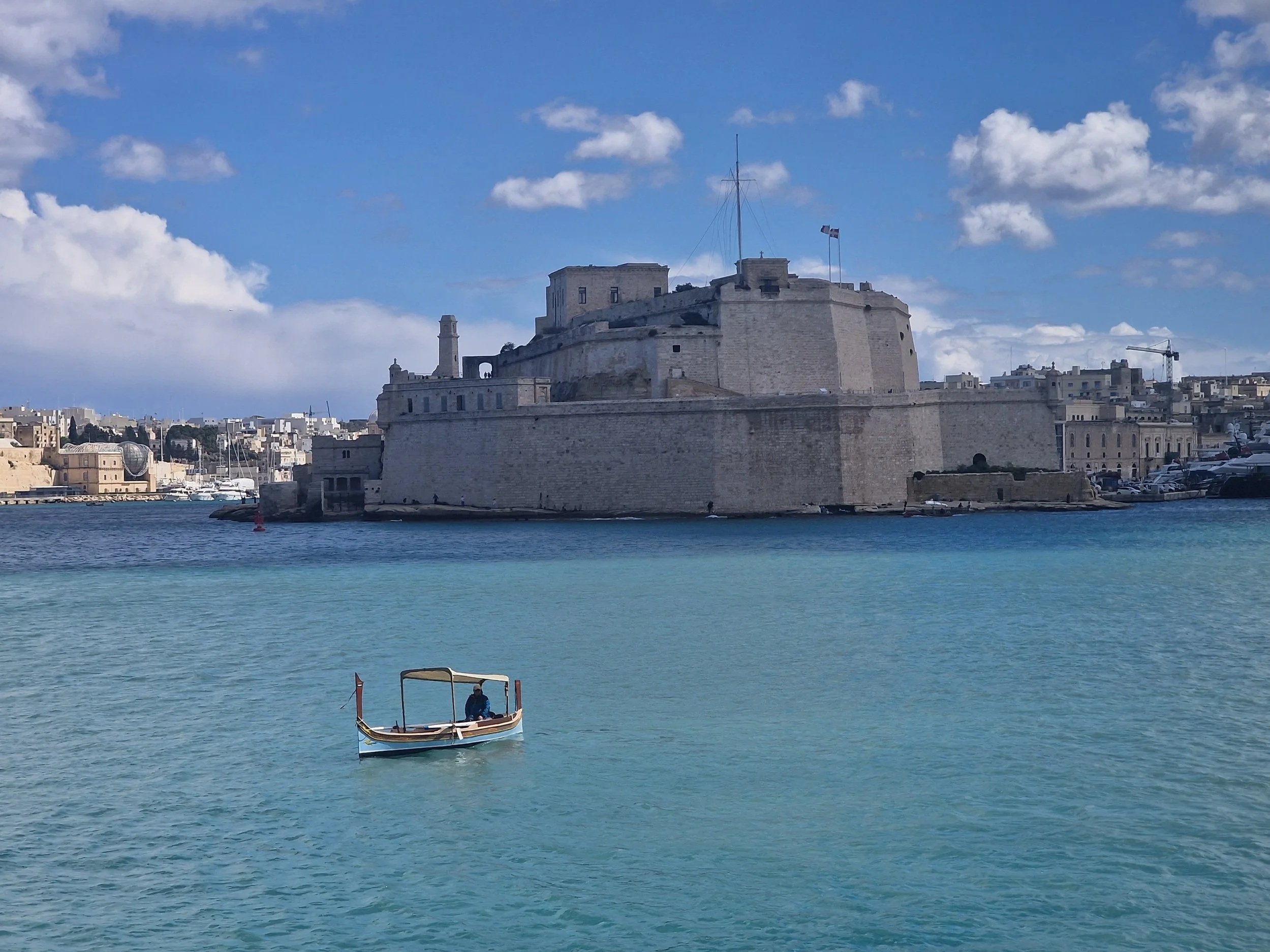 Valletta Grand-Harbour  Fort Saint Angelo & the Daghajsa - a traditional ferry boat of Malta- with SelectedlyTravel